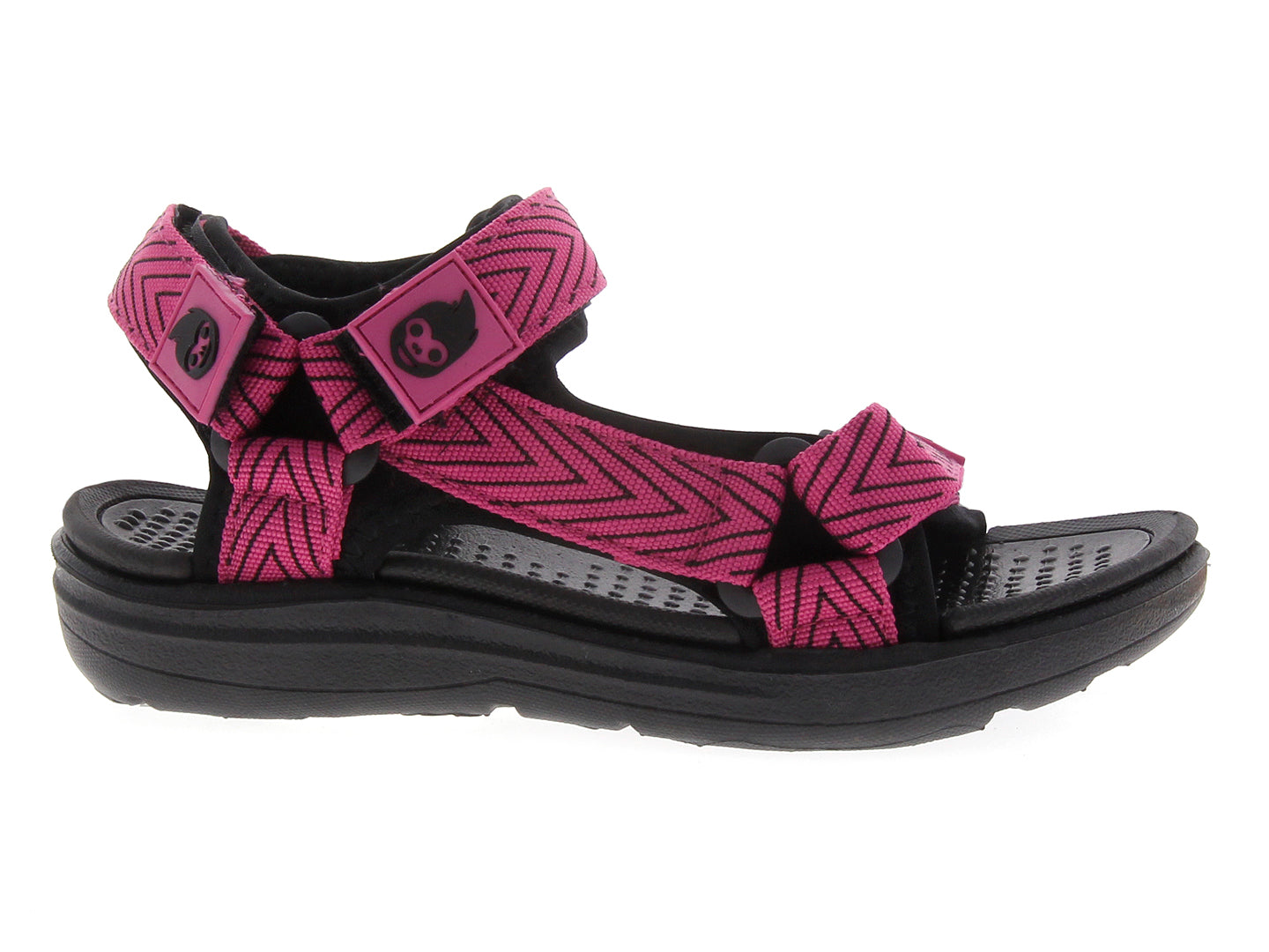 Sandalia gladiador para mujer en color rosa fuscia con suela negra.