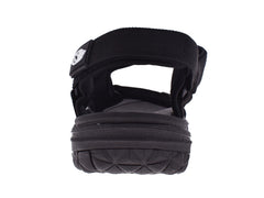 Par de sandalias negras para niños marca UNGA con correas ajustables y suela resistente.