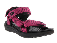 Sandalia gladiador para mujer en color rosa fuscia con suela negra.