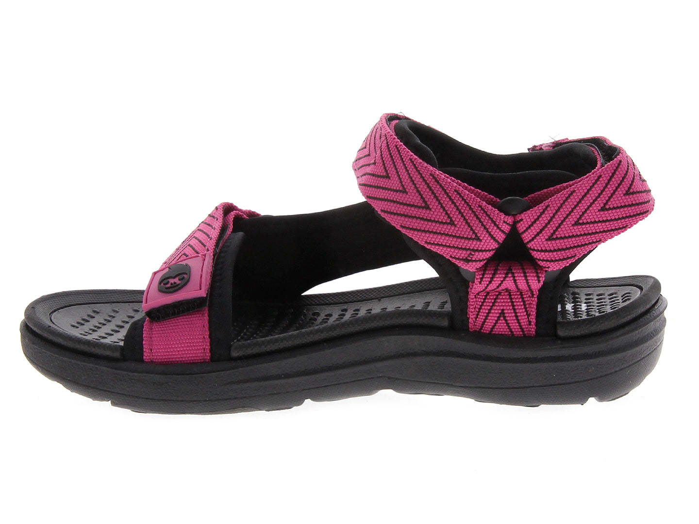 Sandalia gladiador para mujer en color rosa fuscia con suela negra.