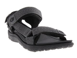Sandalia tipo gladiador para hombre en color gris oscuro con correas texturizadas y suela gruesa.